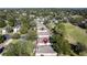 Home's aerial view, highlighting its private location within a golf course community at 2211 Stonebridge Way, Clermont, FL 34711