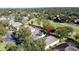 Aerial view showing the home's position in a golf course community at 2211 Stonebridge Way, Clermont, FL 34711