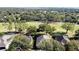 Aerial view of houses near a golf course at 2211 Stonebridge Way, Clermont, FL 34711