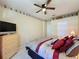 Bedroom with a queen-size bed and ceiling fan at 2211 Stonebridge Way, Clermont, FL 34711