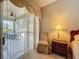 Bedroom with patio access and a view of the backyard at 2211 Stonebridge Way, Clermont, FL 34711