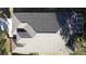 Top-down view of the house showcasing its roof and screened enclosure at 2211 Stonebridge Way, Clermont, FL 34711