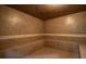 Clean and modern sauna with tiled walls at 2211 Stonebridge Way, Clermont, FL 34711