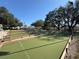 Outdoor shuffleboard courts under a clear blue sky, ready for a friendly game at 3530 Mulberry Grove Loop, Leesburg, FL 34748