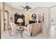 Living room with two reclining sofas and a dark wood entertainment center at 38728 Oak Place Ct, Lady Lake, FL 32159