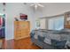 Spacious bedroom with walk-in closet and attached bathroom offers both comfort and functionality at 4130 Capland Ave, Clermont, FL 34711