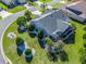 Aerial view showing house, landscaping, and neighborhood at 1315 Greenville Way, The Villages, FL 32162