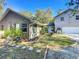 House exterior showcasing a side view and landscaping at 1415 E 9Th Ave, Mount Dora, FL 32757