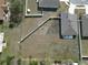 An aerial view showcasing a vacant lot surrounded by houses at 361 Singing Sands Cir, Lake Wales, FL 33859