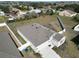 Single Gathering home with a gray roof and a garage at 361 Singing Sands Cir, Lake Wales, FL 33859