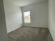 Spacious bedroom with neutral wall paint and carpet at 361 Singing Sands Cir, Lake Wales, FL 33859