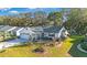 Single-story home with a spacious yard and neighboring houses visible at 1214 Loch Rannoch Ct, Leesburg, FL 34788