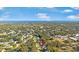 An aerial view showcases the community's landscape and location near the water at 1214 Loch Rannoch Ct, Leesburg, FL 34788