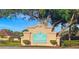 Royal Highlands community sign, set against a blue sky, with mature trees in the background at 21502 King Henry Ave, Leesburg, FL 34748