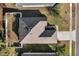 An aerial view highlights the home's roof, landscaping, fenced yard, and its location on a residential street at 2354 Valhalla Dr, Tavares, FL 32778