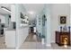 Charming hallway featuring modern flooring and decorative wainscoting at 2354 Valhalla Dr, Tavares, FL 32778