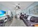 Spacious living room with modern flooring, recessed lighting, and an open floor plan at 2354 Valhalla Dr, Tavares, FL 32778