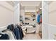 Walk-in closet with ample storage space for clothes, shoes, and accessories at 38230 Yale Cir, Leesburg, FL 34788