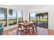 Bright dining room with views of the lake, creating a peaceful atmosphere for any meal at 38230 Yale Cir, Leesburg, FL 34788