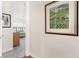 Hallway leading to a bedroom with water view at 38230 Yale Cir, Leesburg, FL 34788