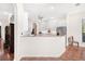 Spacious kitchen featuring an island, granite countertops, and stainless steel appliances at 38230 Yale Cir, Leesburg, FL 34788