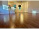 Bright living room with hardwood floors and natural light at 558 Saint Andrews Blvd, The Villages, FL 32159