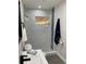 Bathroom showcases marble tile, new vanity, and modern fixtures at 11 The Crescent, Minneola, FL 34715