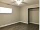 Bedroom showcases new vinyl floors, natural light, and ample closet space at 11 The Crescent, Minneola, FL 34715