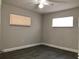 Bedroom with ceiling fan, light-colored walls, blinds, and new vinyl floors at 11 The Crescent, Minneola, FL 34715