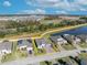 Aerial view of the property, showcasing its location, landscaping, and proximity to nearby amenities at 955 Ladera Ranch Rd, Kissimmee, FL 34759