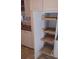 Kitchen featuring custom shelving and storage solutions at 103 Fountain Cv, Leesburg, FL 34748