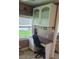 Built-in office nook with lake view, drawers and upper storage in a cozy home at 103 Fountain Cv, Leesburg, FL 34748