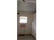 Bright storage room with AC unit, tile flooring and ample storage space at 103 Fountain Cv, Leesburg, FL 34748