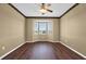 The bedroom features hardwood floors and a bay window at 1063 Mesa Verde Ct, Clermont, FL 34711