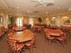 Another of the community game rooms, decorated with comfortable seating and warm colors at 1063 Mesa Verde Ct, Clermont, FL 34711