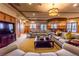 Cozy resident lounge area featuring comfortable seating and a television at 1063 Mesa Verde Ct, Clermont, FL 34711