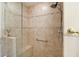 Large walk in shower with tiled walls at 1427 Fortaleza Dr, The Villages, FL 32162