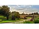 Landscaped entrance to the community with a stone bridge at 16914 Vinci Way, Bella Collina, FL 34756
