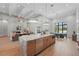Expansive kitchen with marble island, stainless steel appliances, and an open floor plan at 16914 Vinci Way, Bella Collina, FL 34756