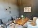 Bright home office with a live edge wooden desk and modern decor at 16914 Vinci Way, Bella Collina, FL 34756