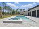 Sparkling pool and spa with a manicured backyard and ample space for relaxation and recreation at 16914 Vinci Way, Bella Collina, FL 34756