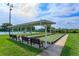 Covered bocce ball courts with benches at 21152 Braveheart Dr, Leesburg, FL 34748