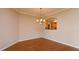 Formal dining room with hardwood floors and a chandelier at 21152 Braveheart Dr, Leesburg, FL 34748