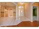 Elegant entryway with tile flooring and access to other rooms at 21152 Braveheart Dr, Leesburg, FL 34748