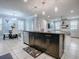 Eat-in kitchen with large island and seating for four at 2150 White Dahlia Dr, Apopka, FL 32712
