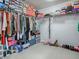 Walk-in closet with clothing racks and shelving for shoes and storage boxes, providing ample storage space at 2150 White Dahlia Dr, Apopka, FL 32712