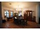 Elegant dining room featuring hardwood floors and a large dining table at 3140 Se 23Rd Pl, Sumterville, FL 33585