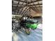 Covered parking for a John Deere Gator and other vehicles at 3140 Se 23Rd Pl, Sumterville, FL 33585