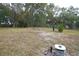 Wooded lot with cleared area and utility hookups at 3140 Se 23Rd Pl, Sumterville, FL 33585