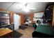 Laundry room with washer, dryer, and extra storage at 3140 Se 23Rd Pl, Sumterville, FL 33585